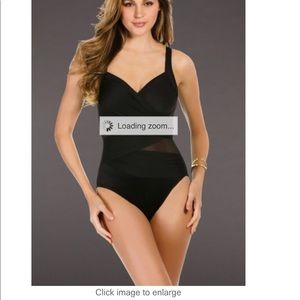 Miracle suit mesh sides one piece